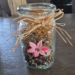 Decorative Glass Jar with Pink Flower Accent. Contains Wearable Vintage